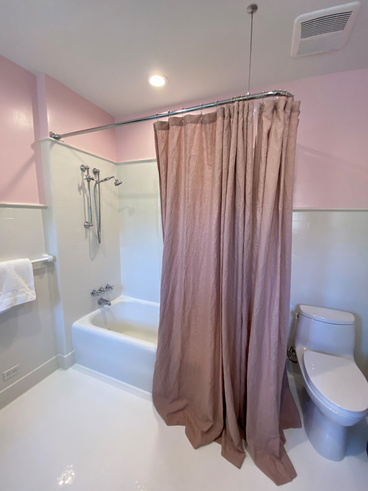 This is an example of a small traditional family bathroom in Los Angeles with shaker cabinets, all types of shower, all types of toilet, all types of wall tile, a submerged sink, white worktops, a single sink, all types of ceiling, white cabinets, a corner bath, white tiles, pink walls, porcelain flooring, marble worktops, white floors, a shower curtain, a built in vanity unit and wainscoting.