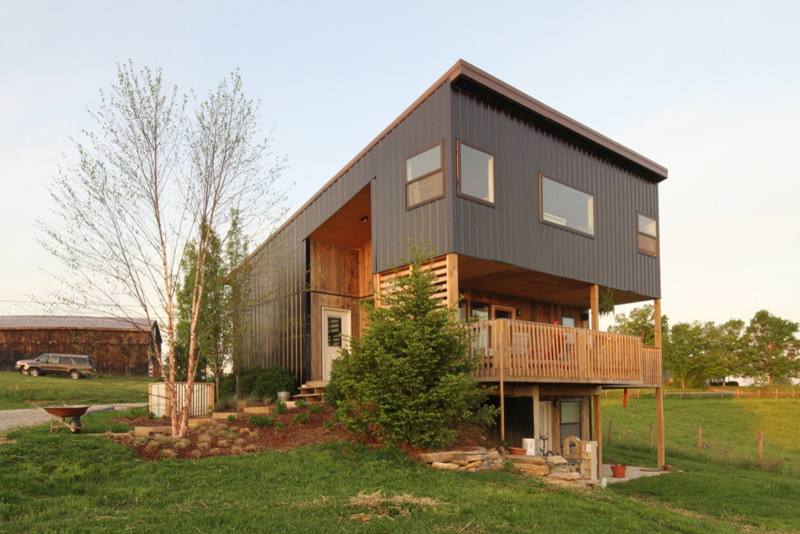 Design ideas for a modern two-storey multi-coloured exterior in Cincinnati with a metal roof.