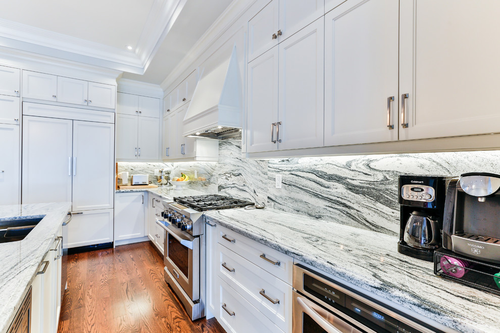 Example of a transitional kitchen design in Toronto