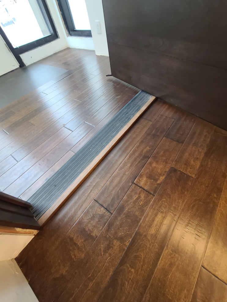 Sleek Engineered Hardwood & Modern Sliding Door by I’m The Man Services
