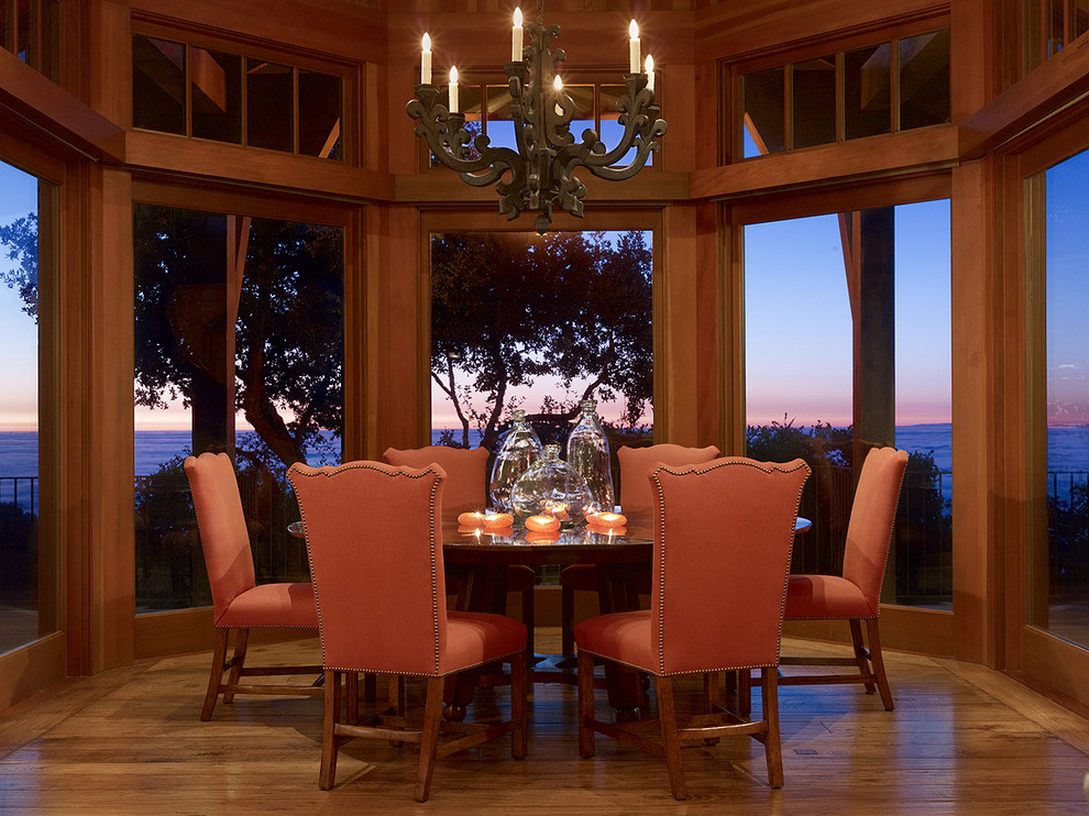 Mediterranean dining room in San Francisco with medium hardwood floors.