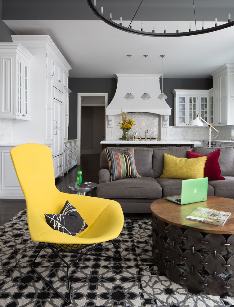 Photo of an eclectic open concept family room in Chicago with grey walls.