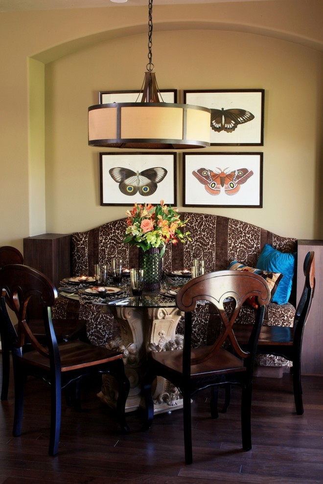 This is an example of an eclectic dining room in Houston.