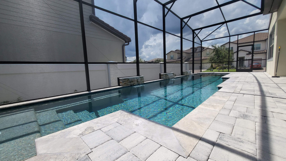 Design ideas for a medium sized classic swimming pool in Orlando.