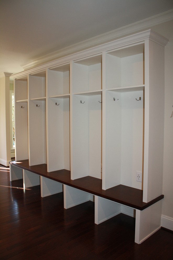 Hallway - transitional dark wood floor hallway idea in Charlotte