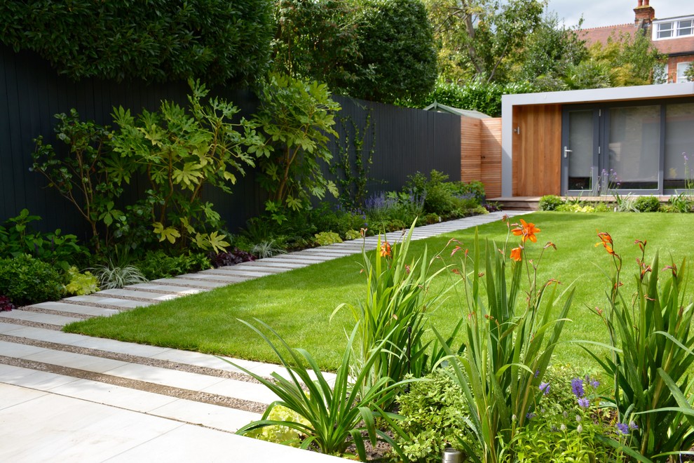 Design ideas for a medium sized contemporary back full sun garden for summer in London.