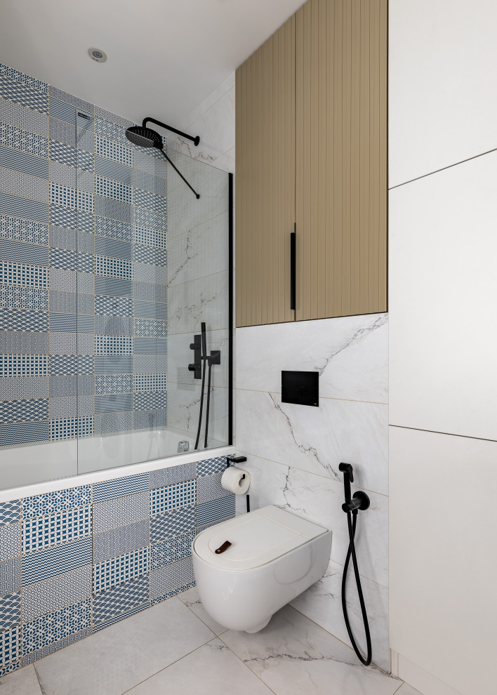 This is an example of a mid-sized contemporary master bathroom in Saint Petersburg with raised-panel cabinets, purple cabinets, an undermount tub, a shower/bathtub combo, a wall-mount toilet, white tile, porcelain tile, white walls, porcelain floors, a drop-in sink, solid surface benchtops, white floor, a shower curtain and white benchtops.