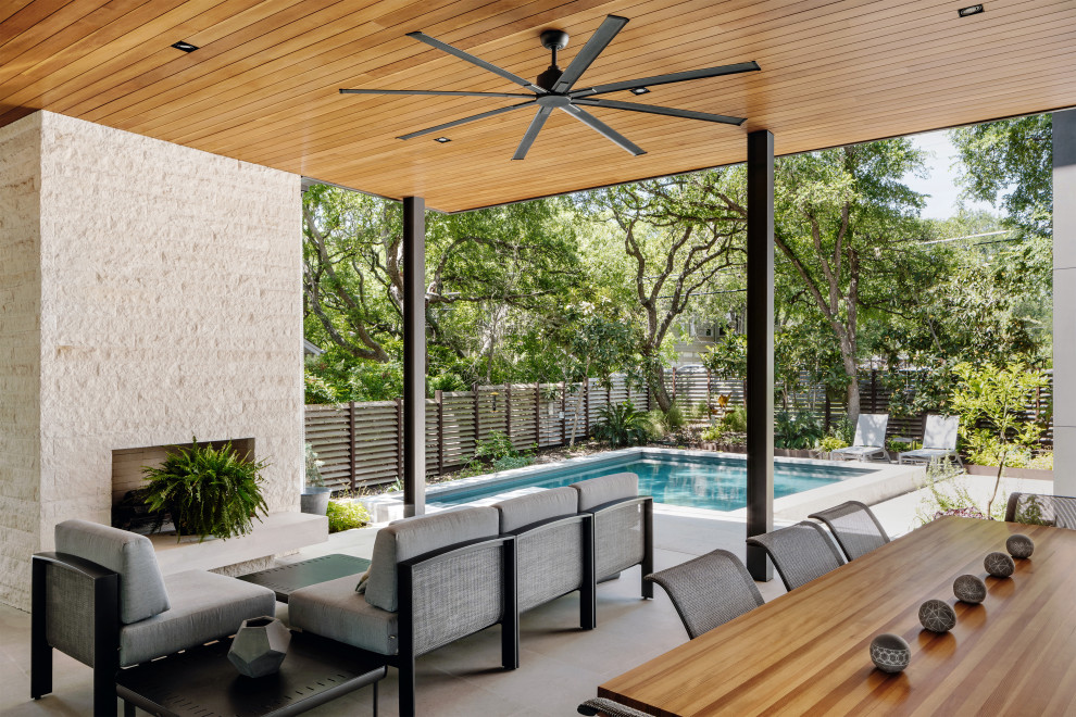 Example of a trendy backyard patio design in Austin with a gazebo