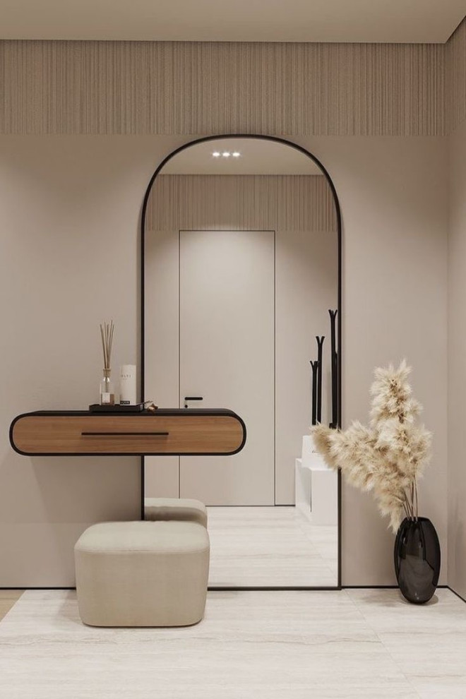 Small modern front door in Melbourne with laminate floors, beige floor and decorative wall panelling.