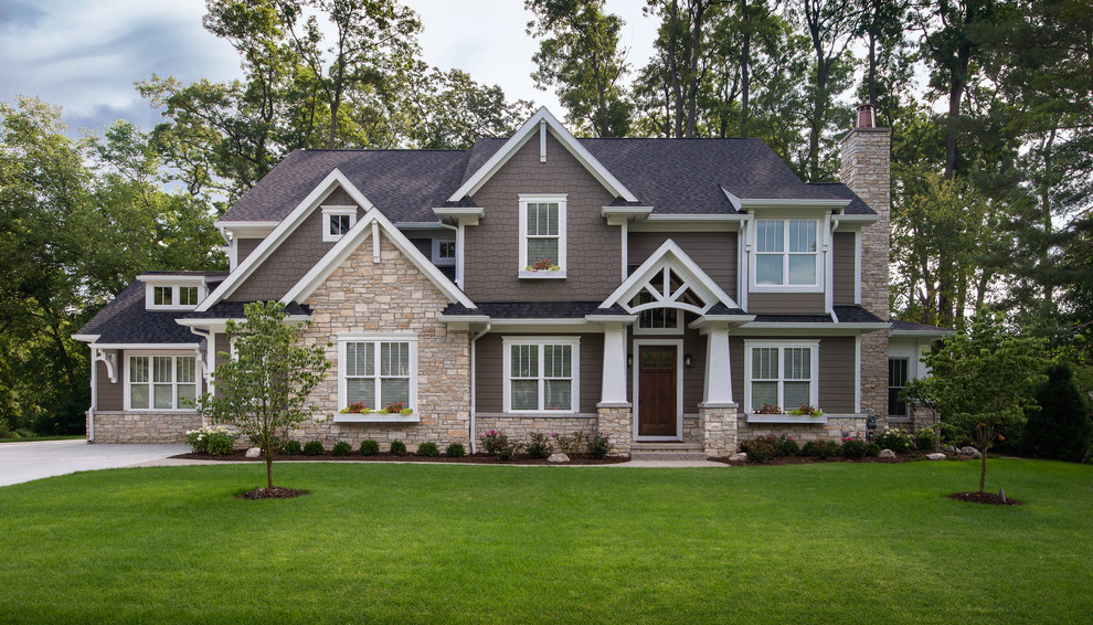 Inspiration for a large craftsman brown two-story concrete fiberboard exterior home remodel in Detroit