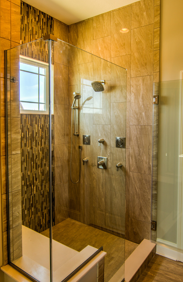 Design ideas for a mid-sized modern master bathroom in Indianapolis with shaker cabinets, medium wood cabinets, medium hardwood floors, an undermount sink and granite benchtops.
