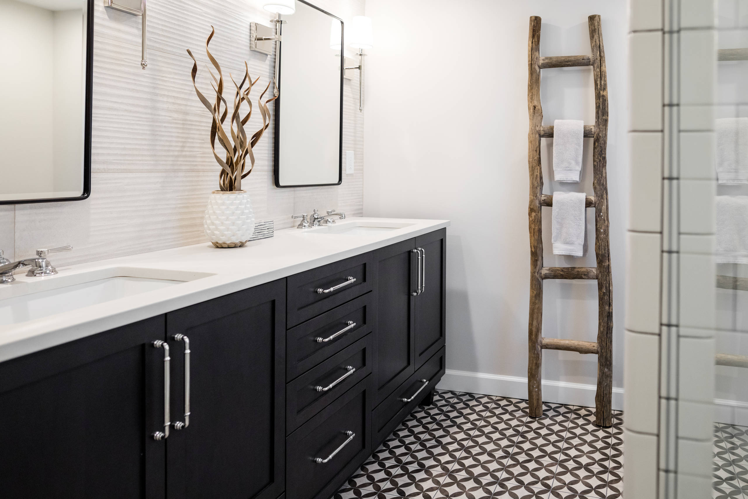 Mid-sized country master white tile and porcelain tile porcelain tile and multicolored floor corner shower photo in Detroit with shaker cabinets, black cabinets, a two-piece toilet, gray walls, an und