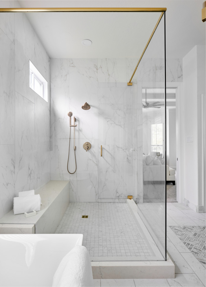 Inspiration for a large transitional master bathroom in Austin with raised-panel cabinets, blue cabinets, a freestanding tub, a one-piece toilet, white tile, porcelain tile, white walls, marble floors, an undermount sink, engineered quartz benchtops, grey floor, white benchtops, a shower seat, a double vanity and a built-in vanity.