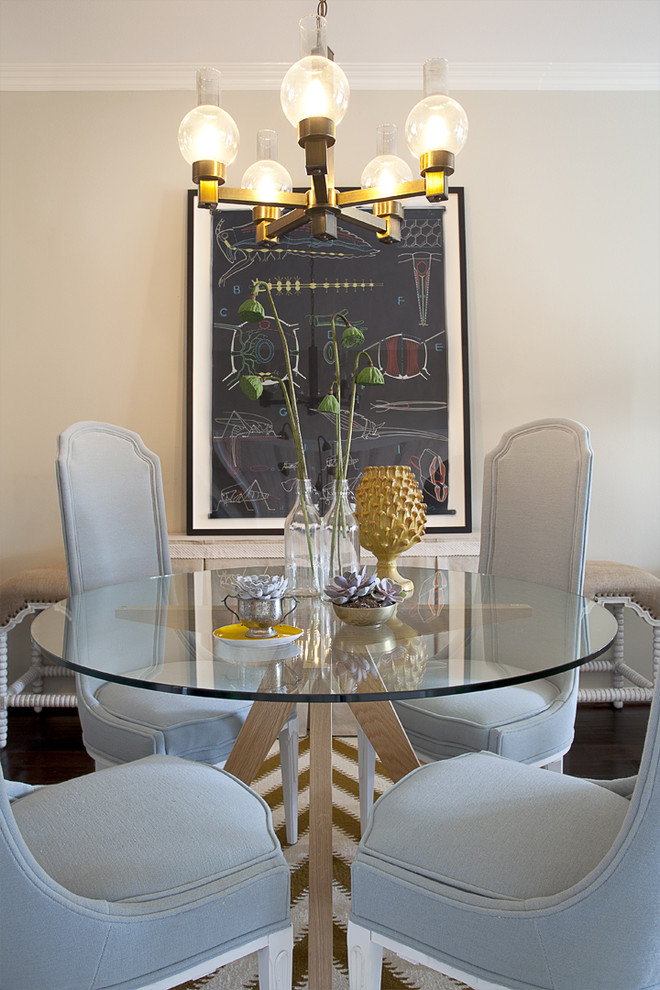 Inspiration for a contemporary dining room in Orange County with white walls and dark hardwood floors.