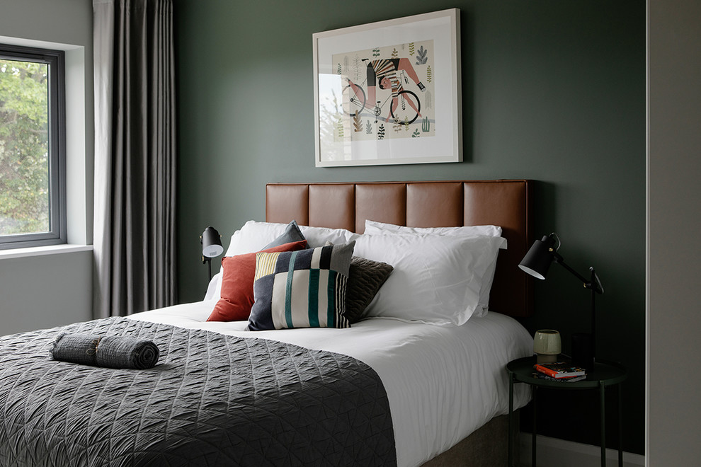 Design ideas for a contemporary guest bedroom in Dublin with white walls.