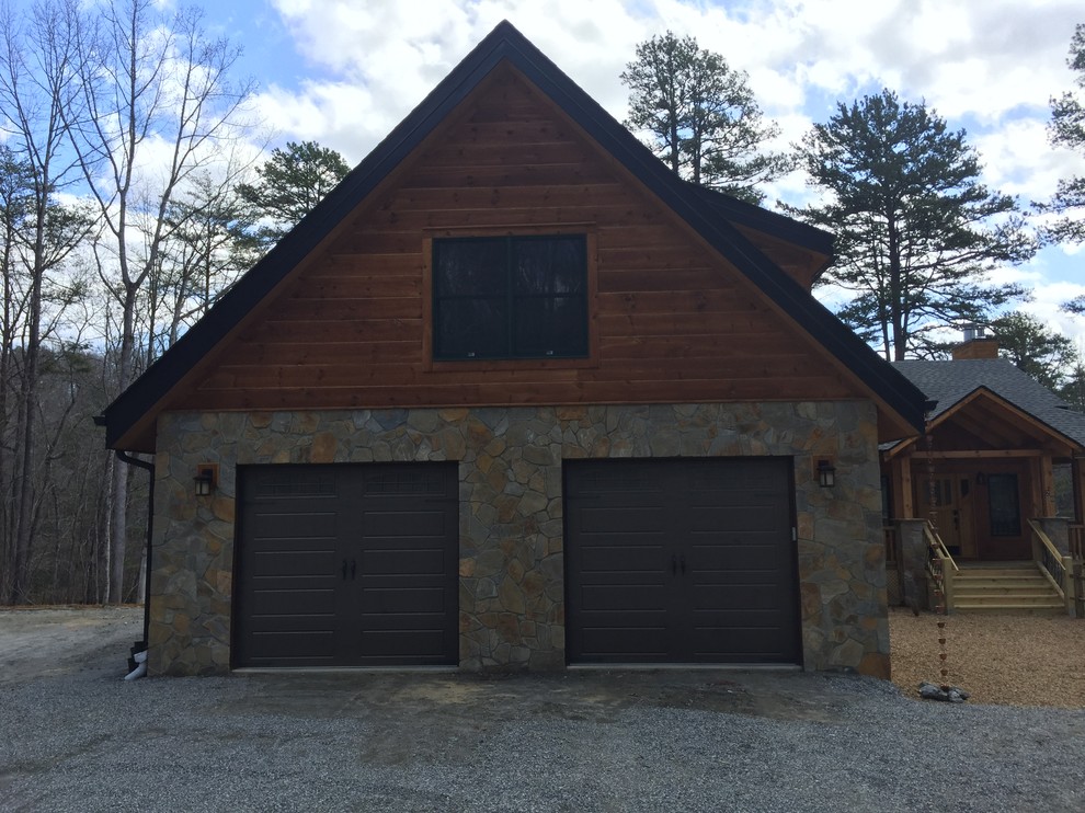 Large rustic multicolored three-story wood gable roof idea with a shingle roof