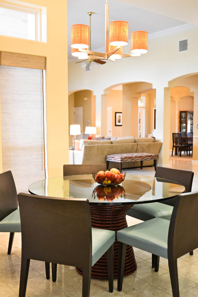 Inspiration for a mid-sized transitional dining room remodel in Austin with beige walls