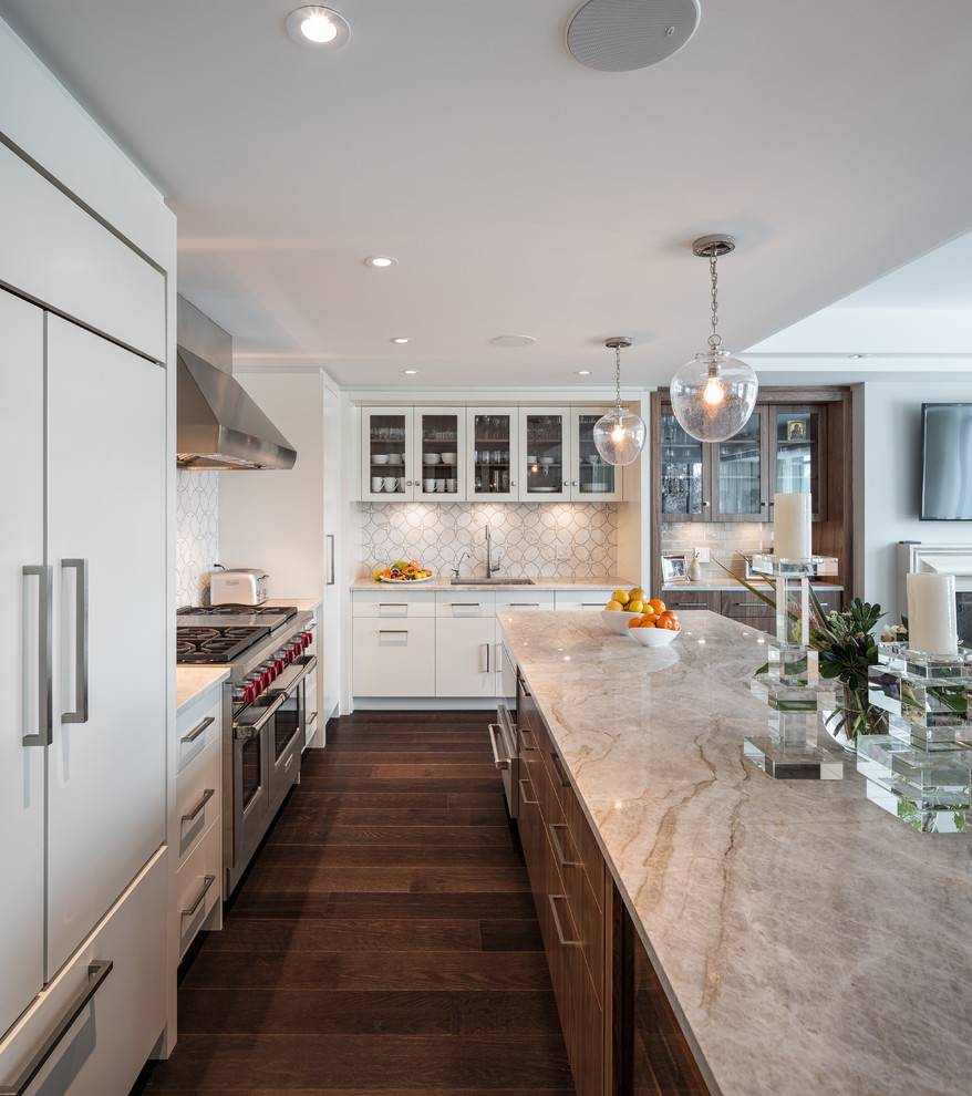 Eat-in kitchen - mid-sized contemporary l-shaped dark wood floor eat-in kitchen idea in Ottawa with an undermount sink, flat-panel cabinets, white cabinets, quartz countertops, white backsplash, mosaic tile backsplash, stainless steel appliances and an island