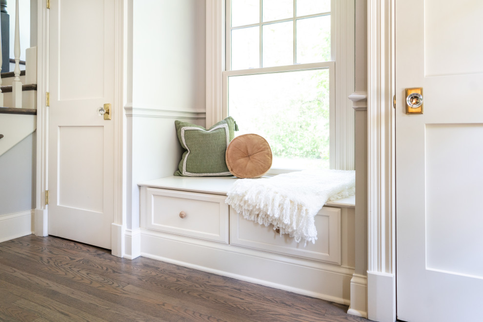 Elegant Entryway with White Door and Natural Light