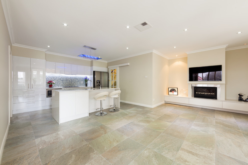 This is an example of a modern kitchen in Sydney with porcelain floors.