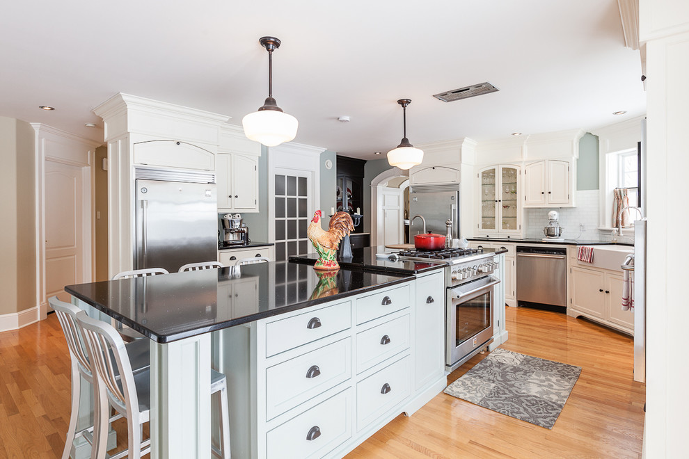 This is an example of a transitional kitchen in Other with stainless steel appliances.