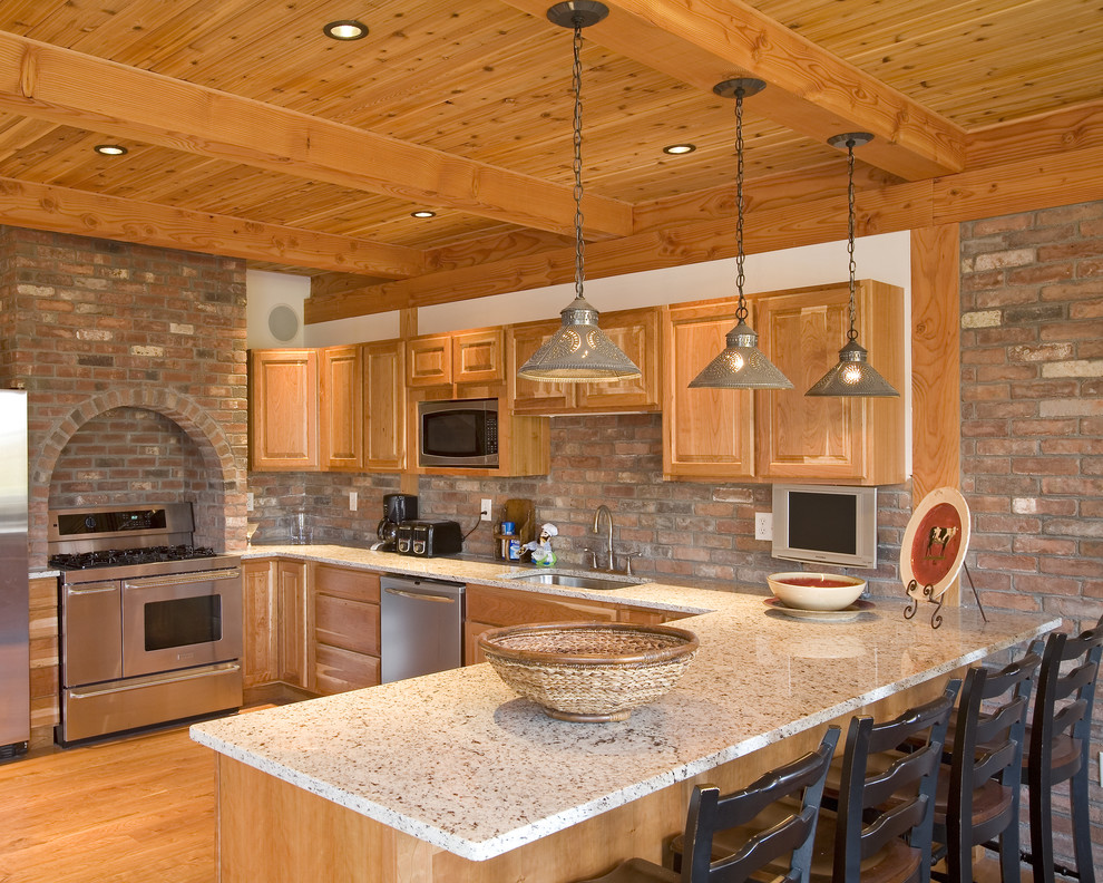 Design ideas for a country kitchen in Burlington with stainless steel appliances.