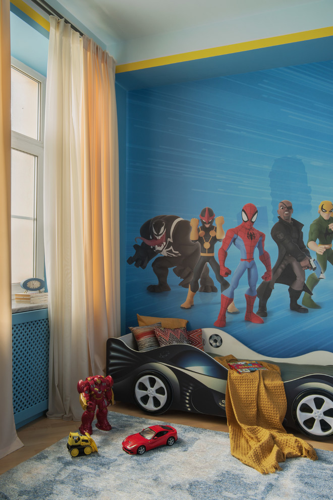 Design ideas for a contemporary kids' bedroom for boys in Moscow with blue walls, light hardwood floors and beige floor.