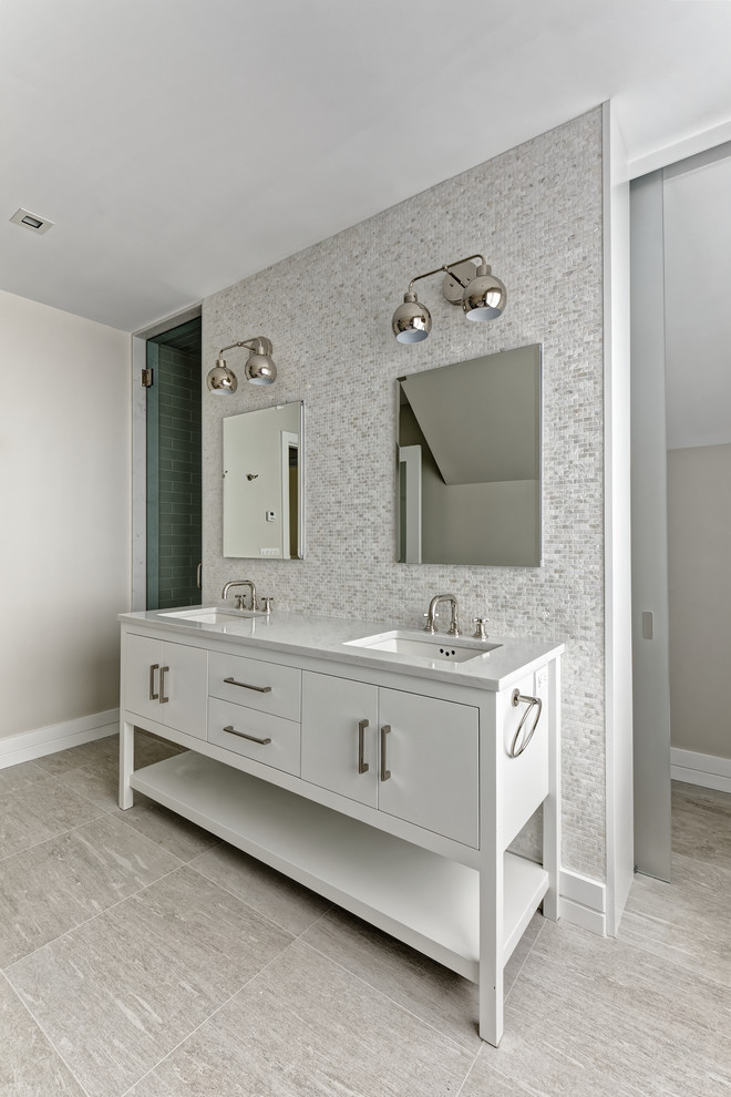 Inspiration for a mid-sized transitional master bathroom in New York with flat-panel cabinets, white cabinets, an alcove shower, a two-piece toilet, white tile, ceramic tile, beige walls, ceramic floors, a console sink, marble benchtops, beige floor, an open shower and grey benchtops.