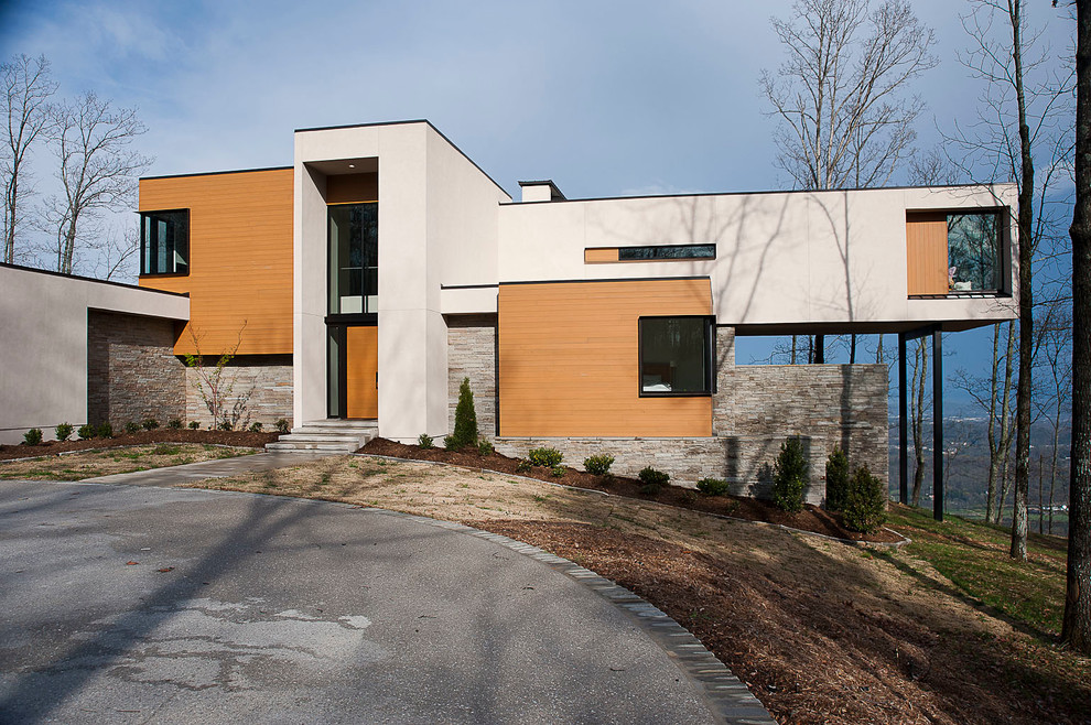 Modern exterior in Other with wood siding.