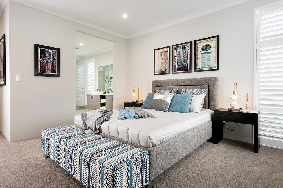 Large transitional master bedroom in Perth with white walls.