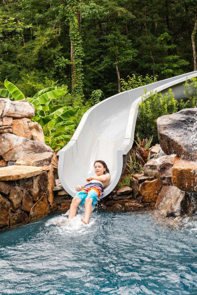 Mountain style pool photo in Jacksonville