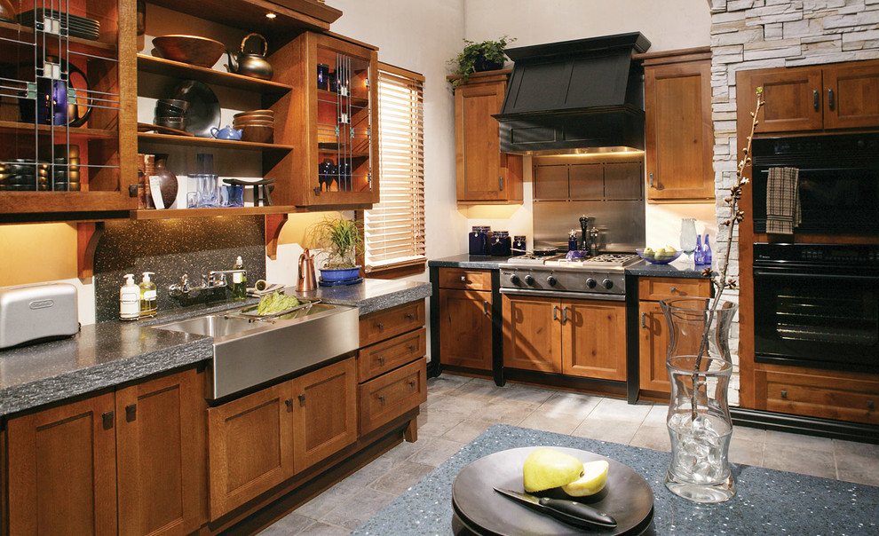 Inspiration for a large transitional l-shaped kitchen remodel in Miami with shaker cabinets, medium tone wood cabinets and an island