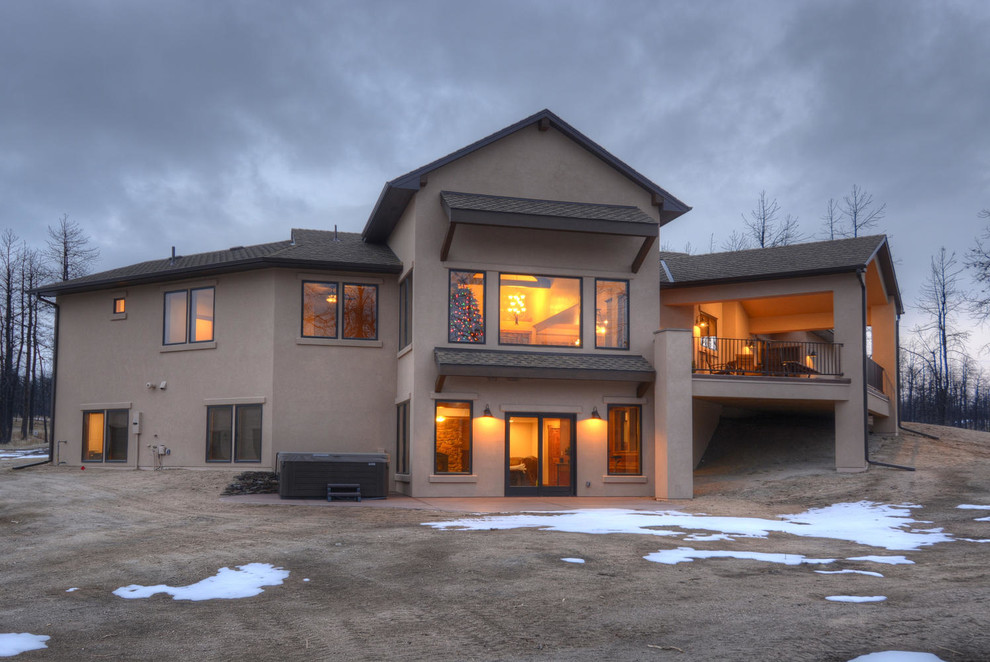 Transitional backyard balcony deck photo in Denver with a roof extension