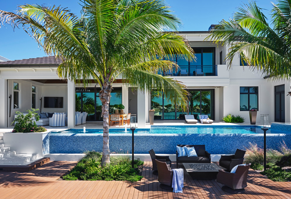 Beach style pool photo in Miami