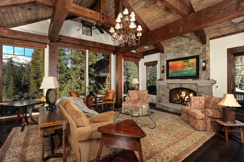 Design ideas for a country formal open concept living room in Denver with white walls, dark hardwood floors, a standard fireplace and a stone fireplace surround.