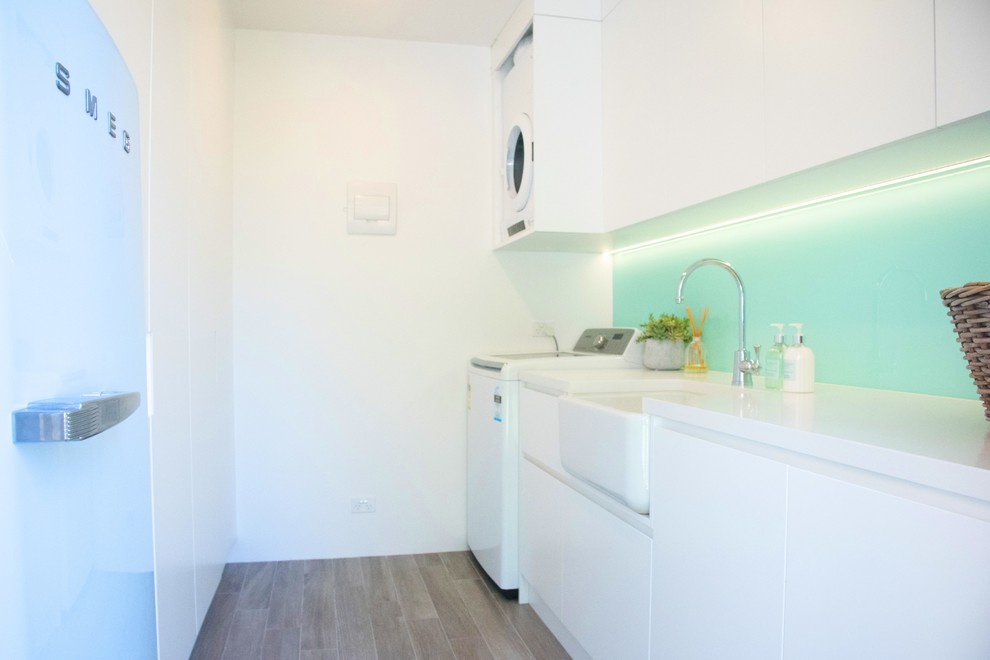 Inspiration for a modern laundry room in Sydney.