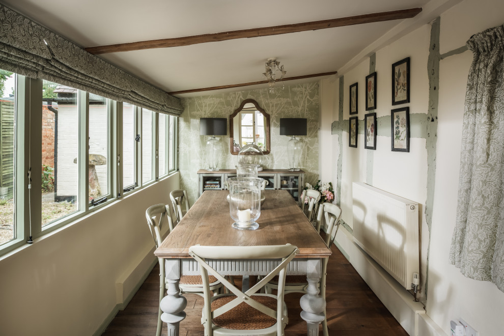 Inspiration for a mid-sized traditional separate dining room in Oxfordshire with multi-coloured walls and dark hardwood floors.