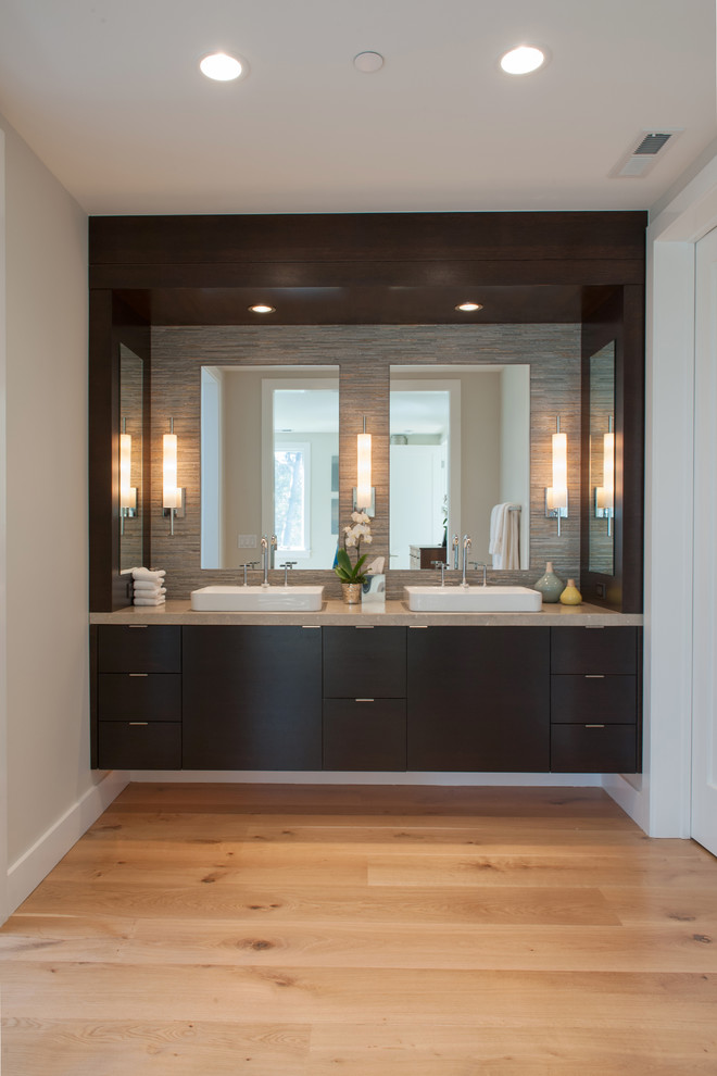 This is an example of a contemporary bathroom in San Francisco with flat-panel cabinets.