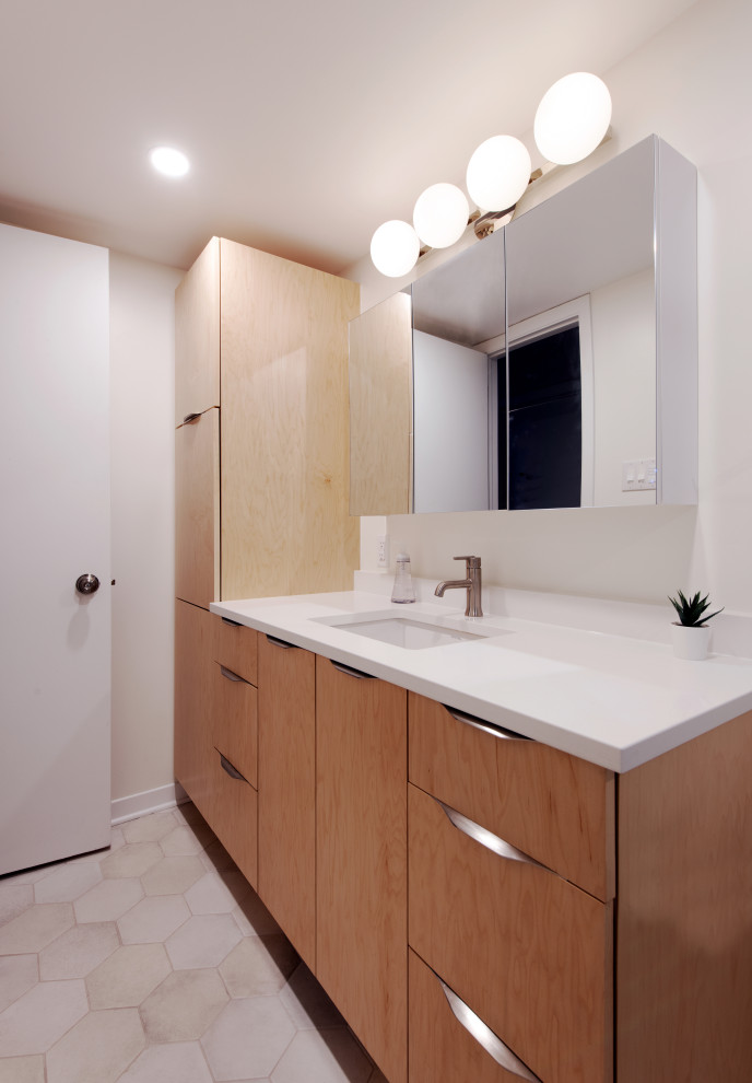 Mid-sized transitional l-shaped medium tone wood floor, gray floor and vaulted ceiling open concept kitchen photo in Ottawa with a double-bowl sink, shaker cabinets, gray cabinets, quartz countertops, white backsplash, subway tile backsplash, stainless steel appliances, an island and white countertops