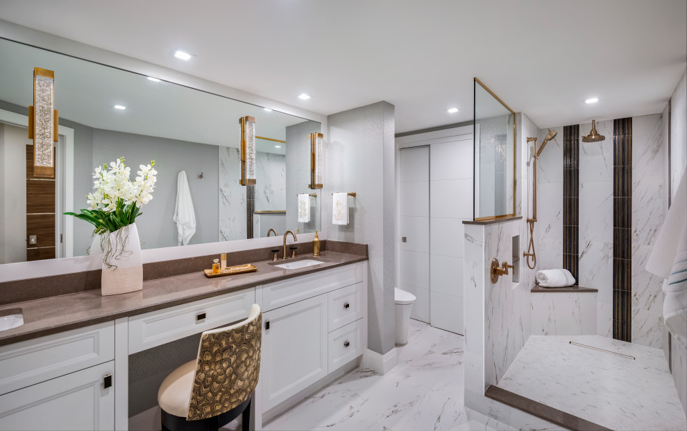 Inspiration for a traditional ensuite bathroom in Miami with flat-panel cabinets, white cabinets, multi-coloured tiles, marble tiles, white walls, marble flooring, engineered stone worktops, multi-coloured floors, double sinks and a built in vanity unit.