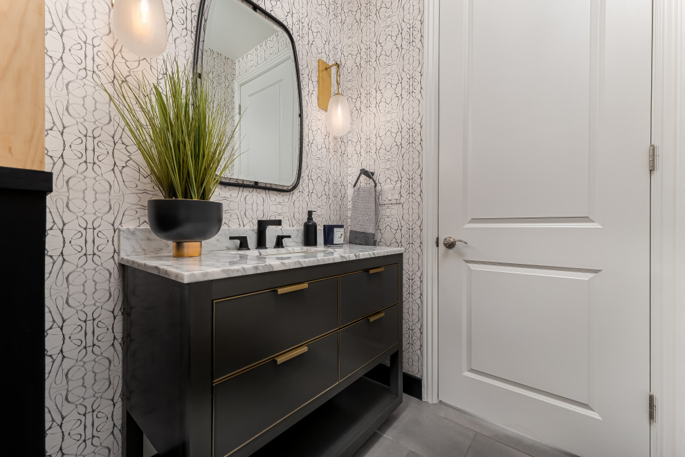 This is an example of a small contemporary cloakroom in Los Angeles with flat-panel cabinets, grey cabinets, grey tiles, white worktops and a freestanding vanity unit.