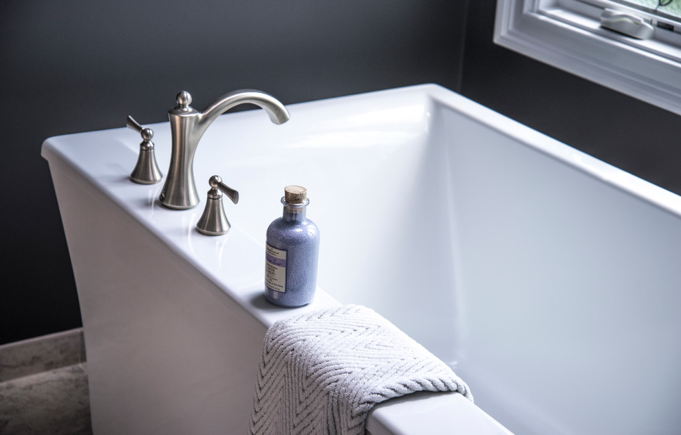 Inspiration for a mid-sized transitional master gray tile and subway tile porcelain tile freestanding bathtub remodel in Chicago with flat-panel cabinets, white cabinets, a two-piece toilet, gray walls, an undermount sink and granite countertops