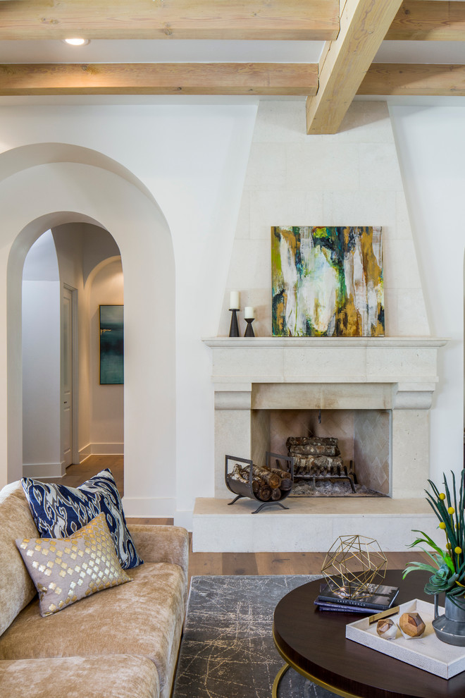 Inspiration for a large contemporary formal enclosed living room in Austin with white walls, light hardwood floors, a standard fireplace, a tile fireplace surround and no tv.