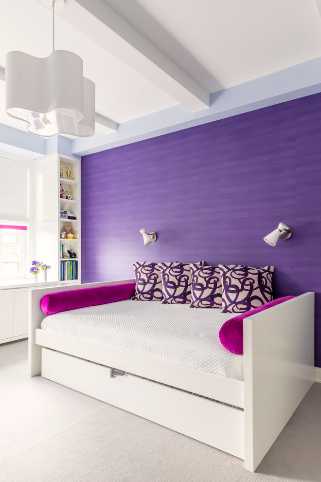 Inspiration for a transitional bedroom in New York with purple walls and carpet.