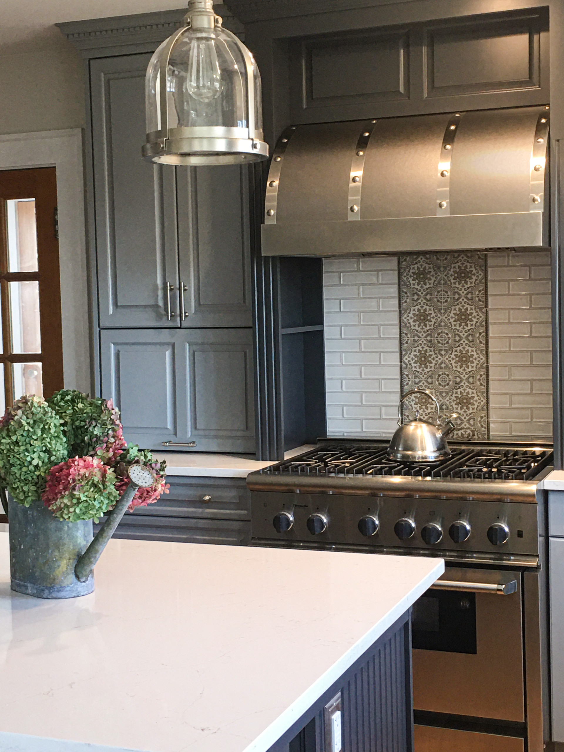 Kitchens featuring a ZLINE Under Cabinet Range Hood