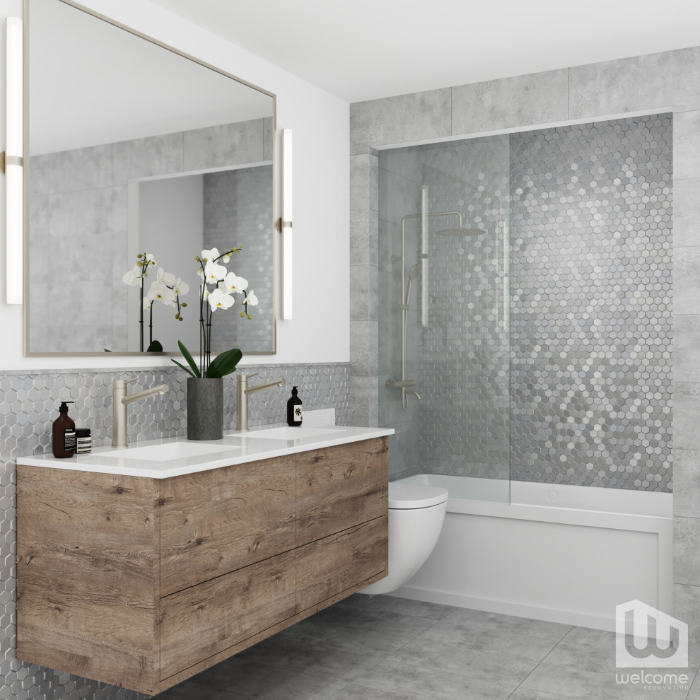 Design ideas for a mid-sized modern 3/4 bathroom in Los Angeles with flat-panel cabinets, distressed cabinets, an alcove tub, a shower/bathtub combo, a wall-mount toilet, gray tile, mosaic tile, white walls, ceramic floors, an integrated sink, engineered quartz benchtops, grey floor, a hinged shower door, white benchtops, a niche, a double vanity and a floating vanity.