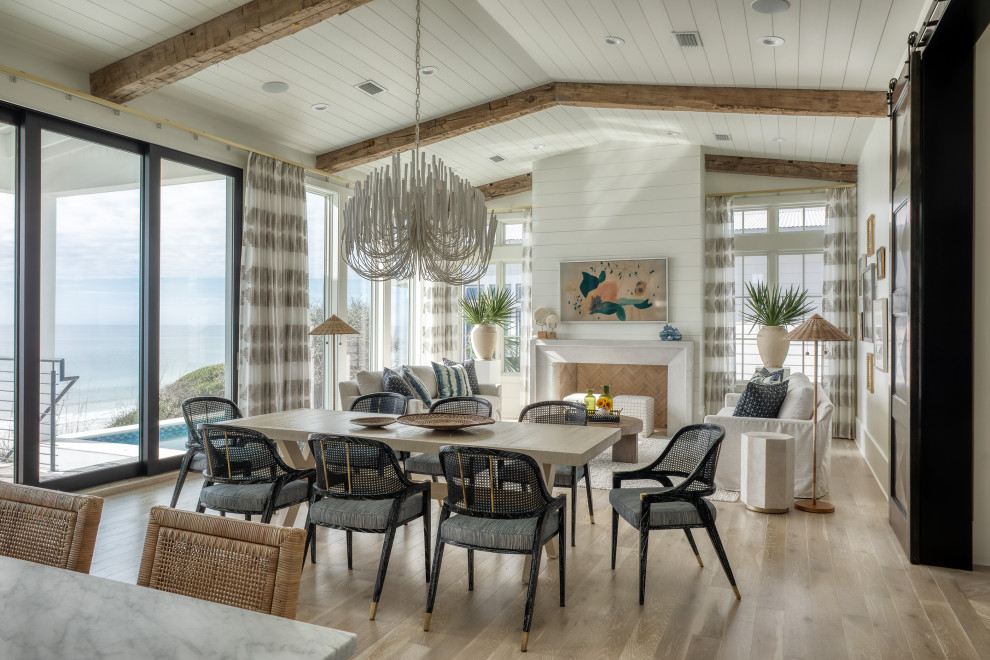 Living room - large coastal open concept painted wood floor, beige floor, exposed beam and shiplap wall living room idea in Other with white walls, a standard fireplace, a shiplap fireplace and a wall-mounted tv