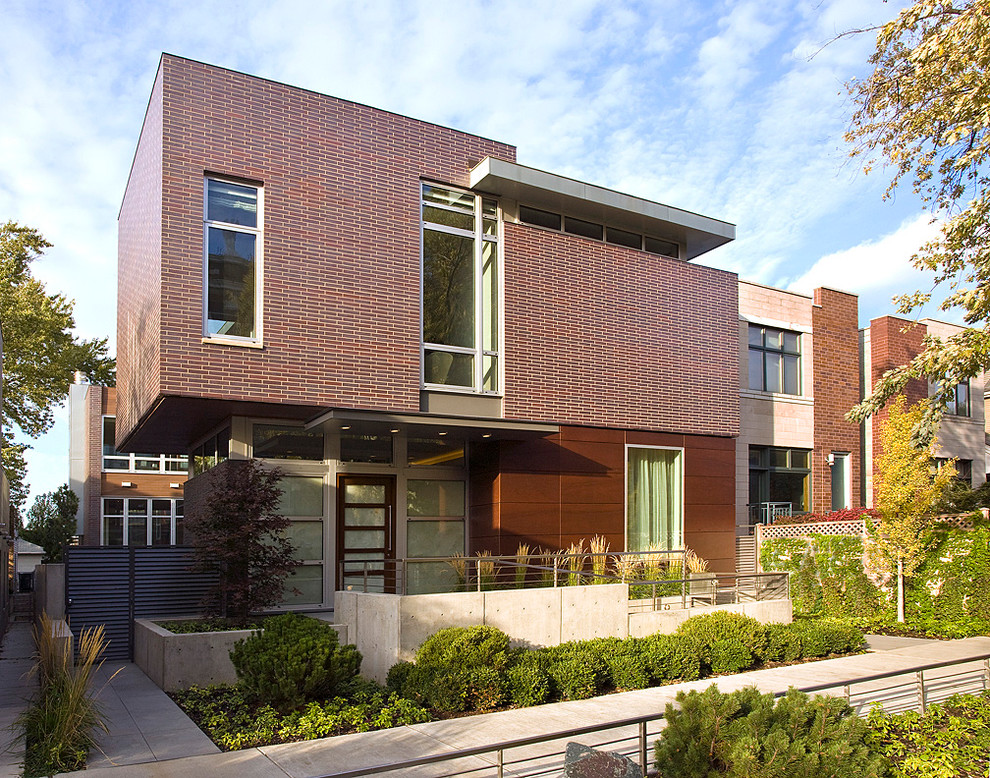 Design ideas for a contemporary exterior in Chicago with wood siding.