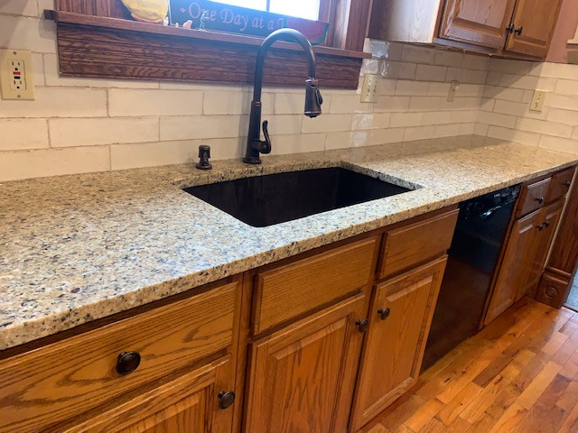 Kitchen - kitchen idea with white backsplash and porcelain backsplash