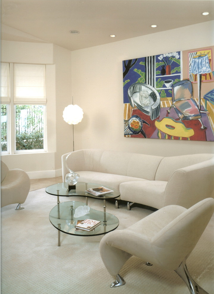This is an example of a contemporary living room in Los Angeles with white walls.